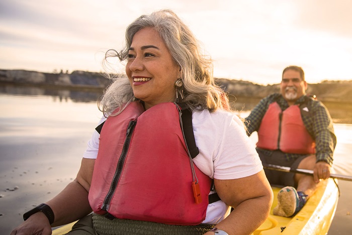Middle age couple kayaking