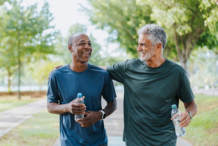 Friends cooling down after a jog