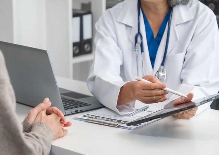 Doctor consulting with patient about radiofrequency ablation