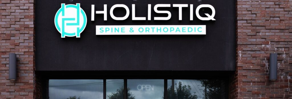 Holsitiq Spine & Orthopaedic Exterior sign for it's Allen TX clinic