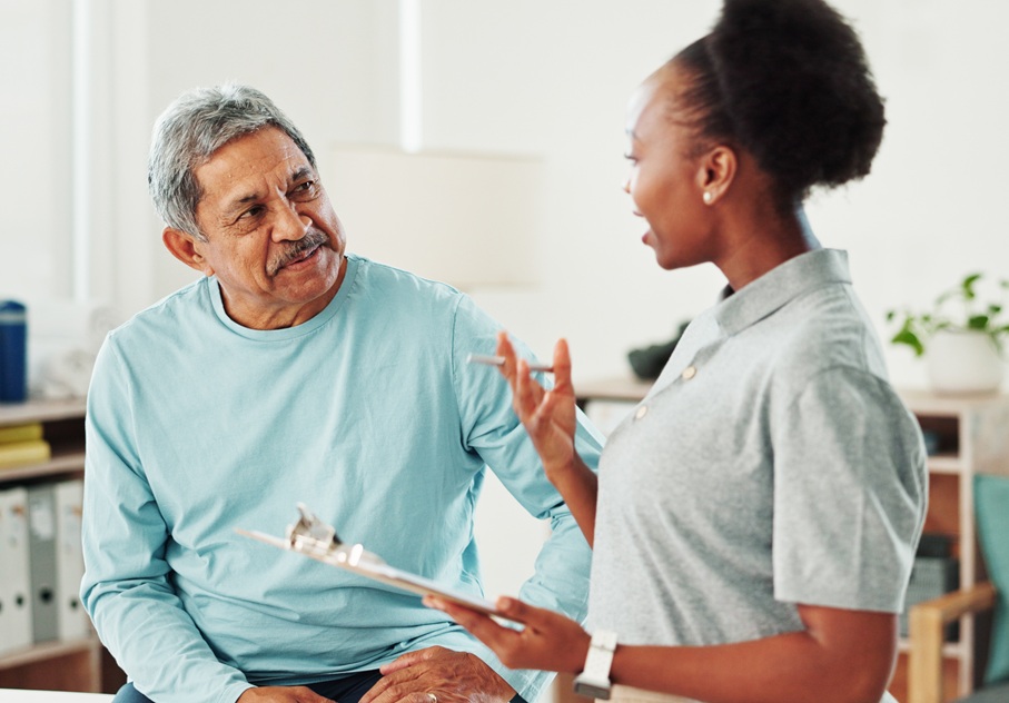 Provider performing a clinical pain assessment