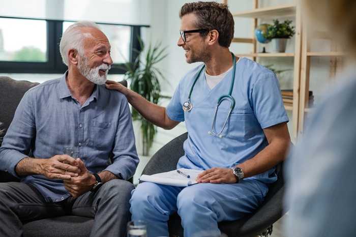 Doctor preparing patient for a medial branch nerve block