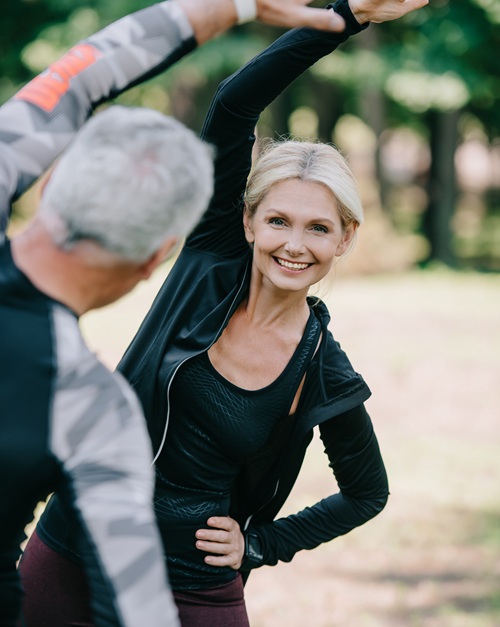 Woman practicing yoga outside