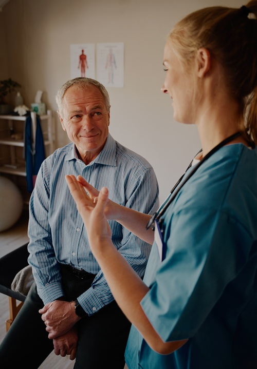 Pain management doctor explaining piriformis syndrome treatment